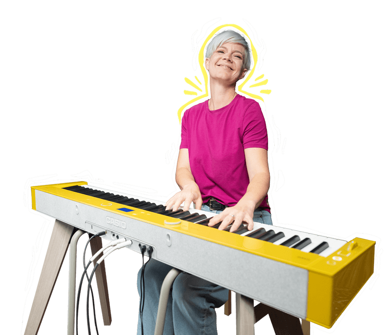Lisa playing yellow keyboard